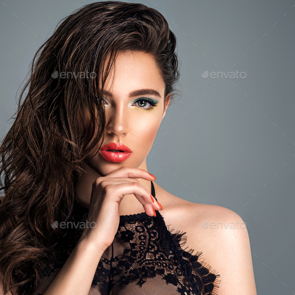 Beautiful Brunette Woman With Bright Red Lipstick On Her Lips Stock